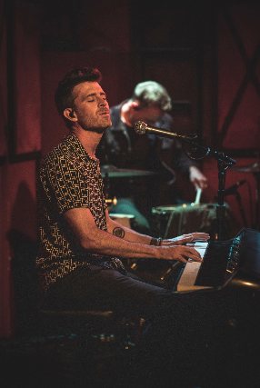 Poster: Brendan James w/ guests (partially seated)